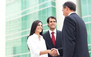 Commercial Real Estate Broker Shaking Hands with Clients